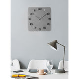 Grey Vintage Square wall clock styled on a wall
