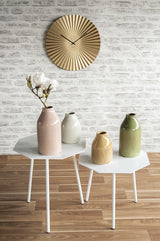Gold Sensu XL wall clock styled in a dining space