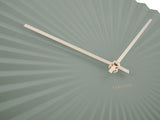 Jungle green Sensu XL wall clock styled on a wall