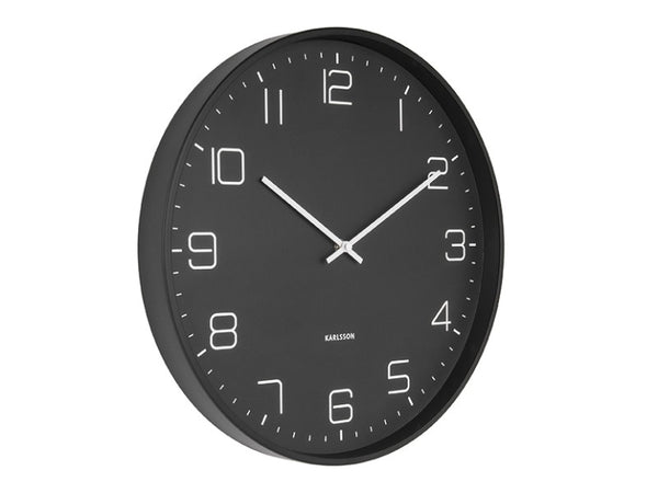 Karlsson Lofty Wall Clock in matte black with light numerals, front view on white
