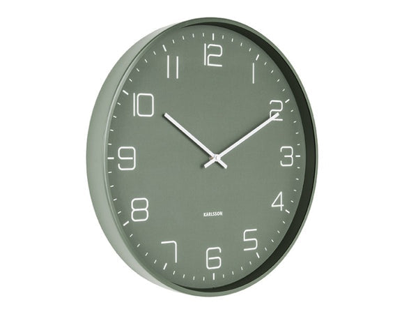 Karlsson Lofty Wall Clock in matte green, angled view showing the iron case and glass cover