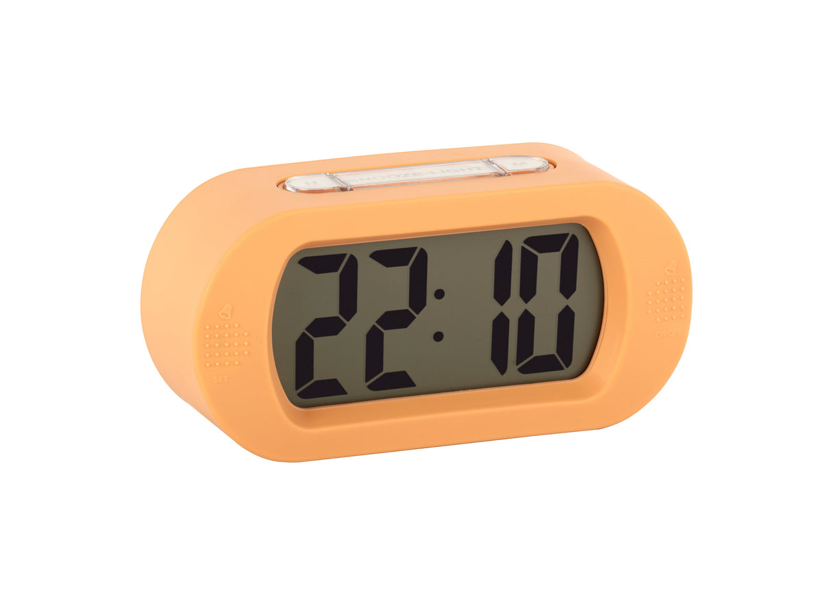 Karlsson Gummy Digital Alarm Clock in soft orange, angled view with the display unlit