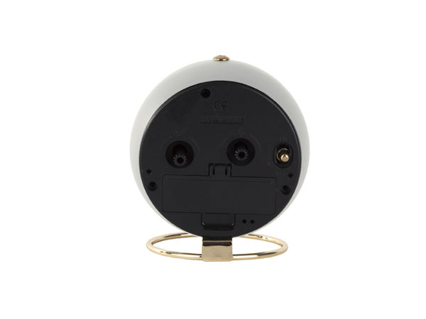 Rear view of the White Globe alarm clock showing the battery compartment