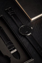 Karlsson Mr Black Steel men's watch with black leather strap on wrist