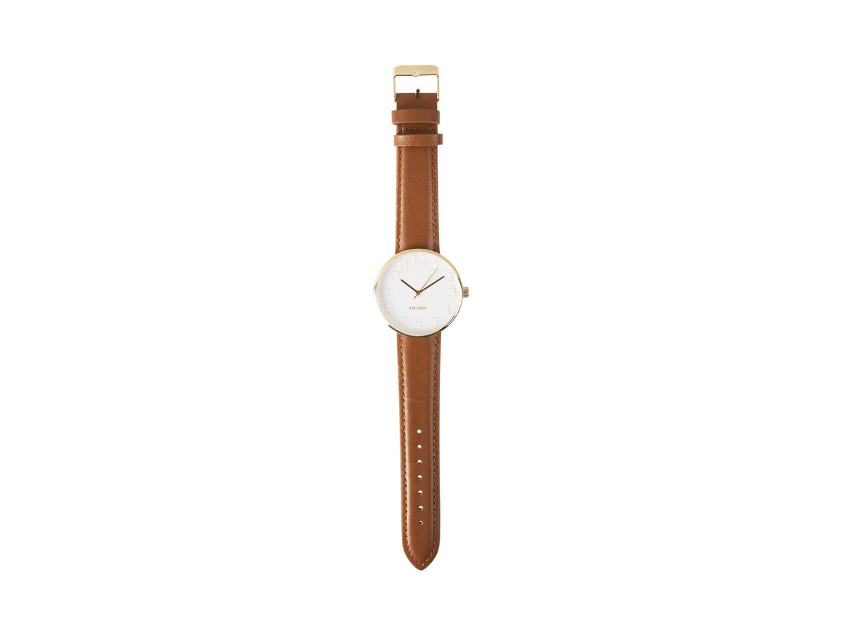 Karlsson Mr White Steel watch photographed flat with the tan leather strap extended
