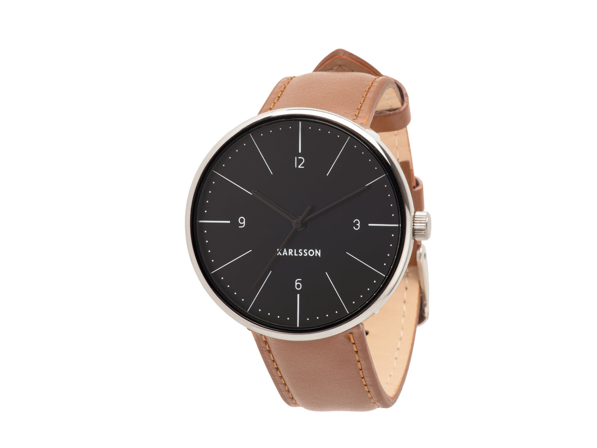 Karlsson Normann watch with a black dial and tan leather strap, shown at an angle