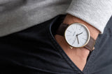 Karlsson Normann mens watch in white with chocolate leather strap and gold casing
