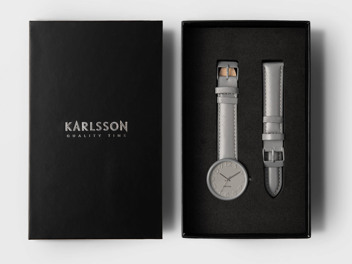 Karlsson Ms Grey watch in its black Karlsson presentation box with a spare grey leather strap