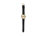 Karlsson Finesse women's watch with black case and gold dial on black leather strap