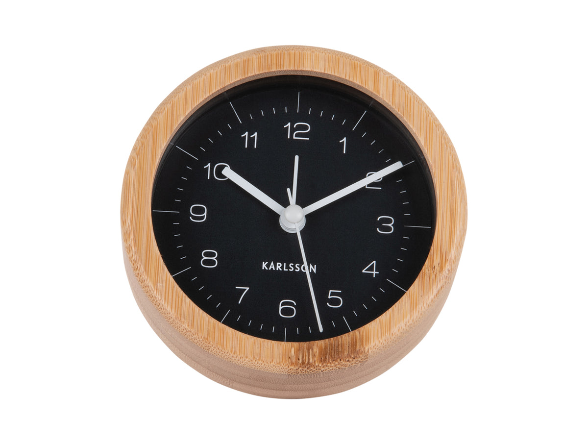 Karlsson bamboo alarm clock with a black dial, front view