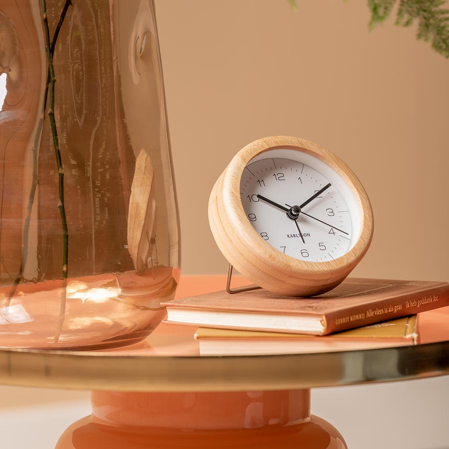 Karlsson Neat Round Bamboo Alarm Clock, front view showing the white dial