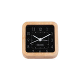 Black Neat Square bamboo alarm clock shown from an angle