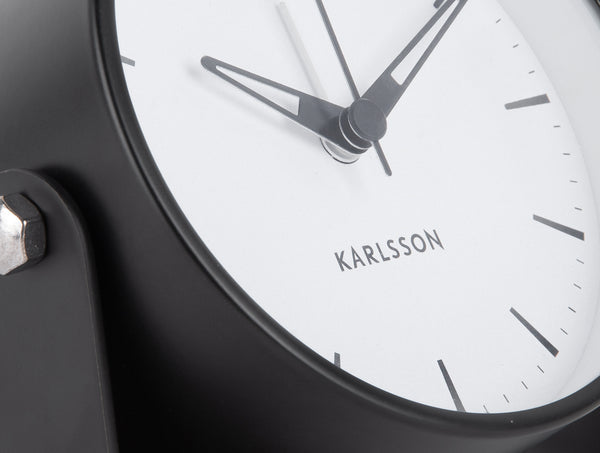 Close-up of the black Calm alarm clock frame and white Karlsson dial