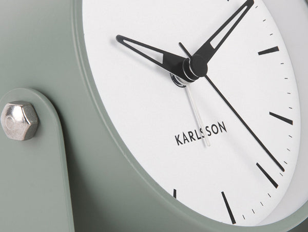 Close-up of the Greyed Jade Calm alarm clock frame and white Karlsson dial