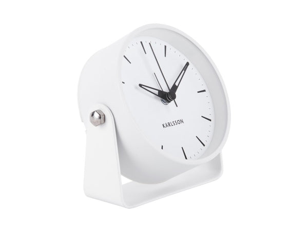 Karlsson Calm Alarm Clock in white, angled on its stand against a white background