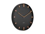 Black Grace wall clock shown front on under glass cover