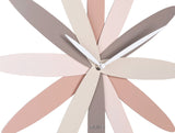 Detail of the layered pink petals on the Bloom wall clock
