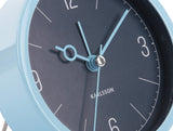 Close up of the night blue Monocle clock face and glass lens