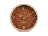 Caramel brown Monocle alarm clock shown from an angle