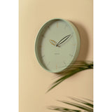 Detail of the petal shaped hands on the grayed jade Petals clock