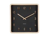 Detail of the black Nervadura square wall clock face