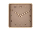 Detail of the soft brown Nervadura square wall clock dial