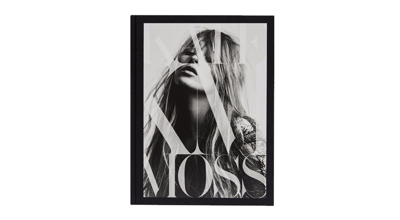A black and white photo of a woman with long hair from KATE: THE KATE MOSS BOOK by Books.