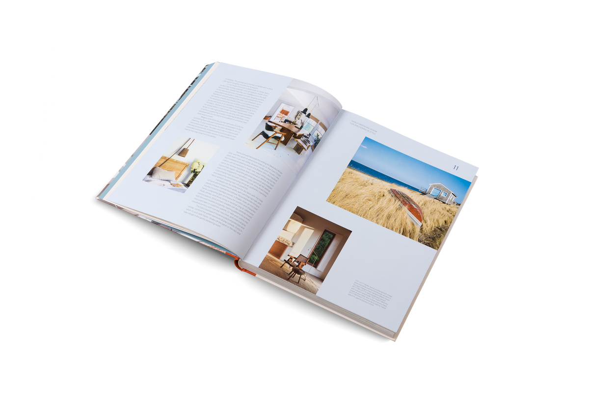 Life's a Beach open at a spread of coastal photographs