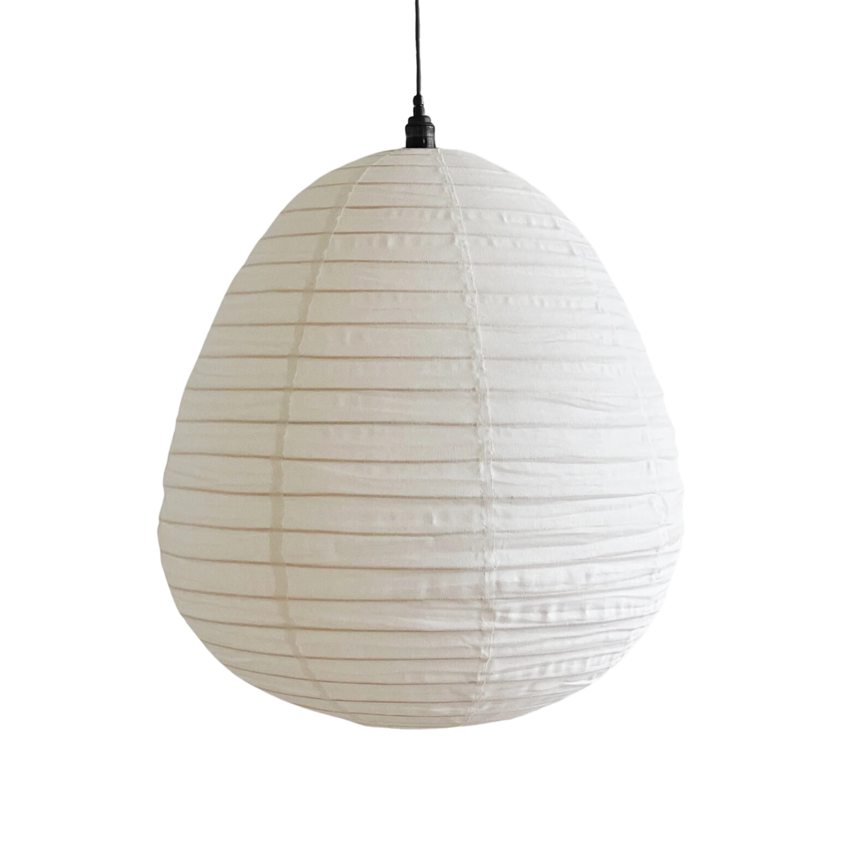 White linen pear-shaped pendant shade hanging from a black cord