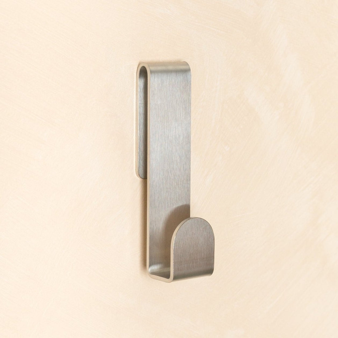 Close up of FOLD Loop Hook Aluminium finish by Made of Tomorrow