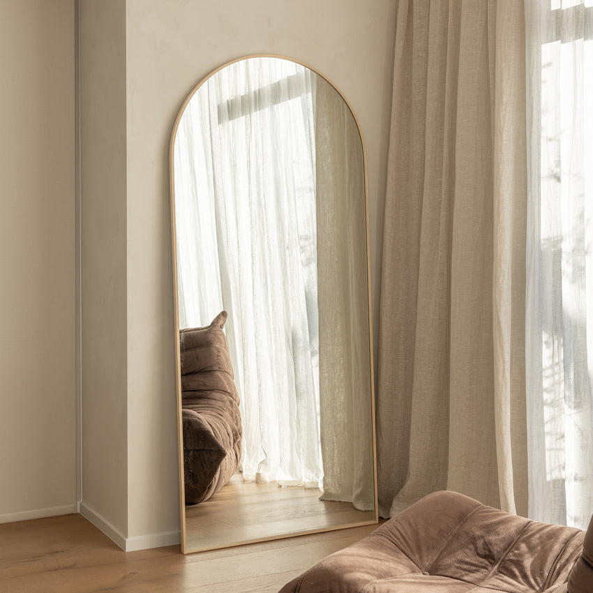 Framed Arch Mirror in oak styled in a bedroom by Made of Tomorrow