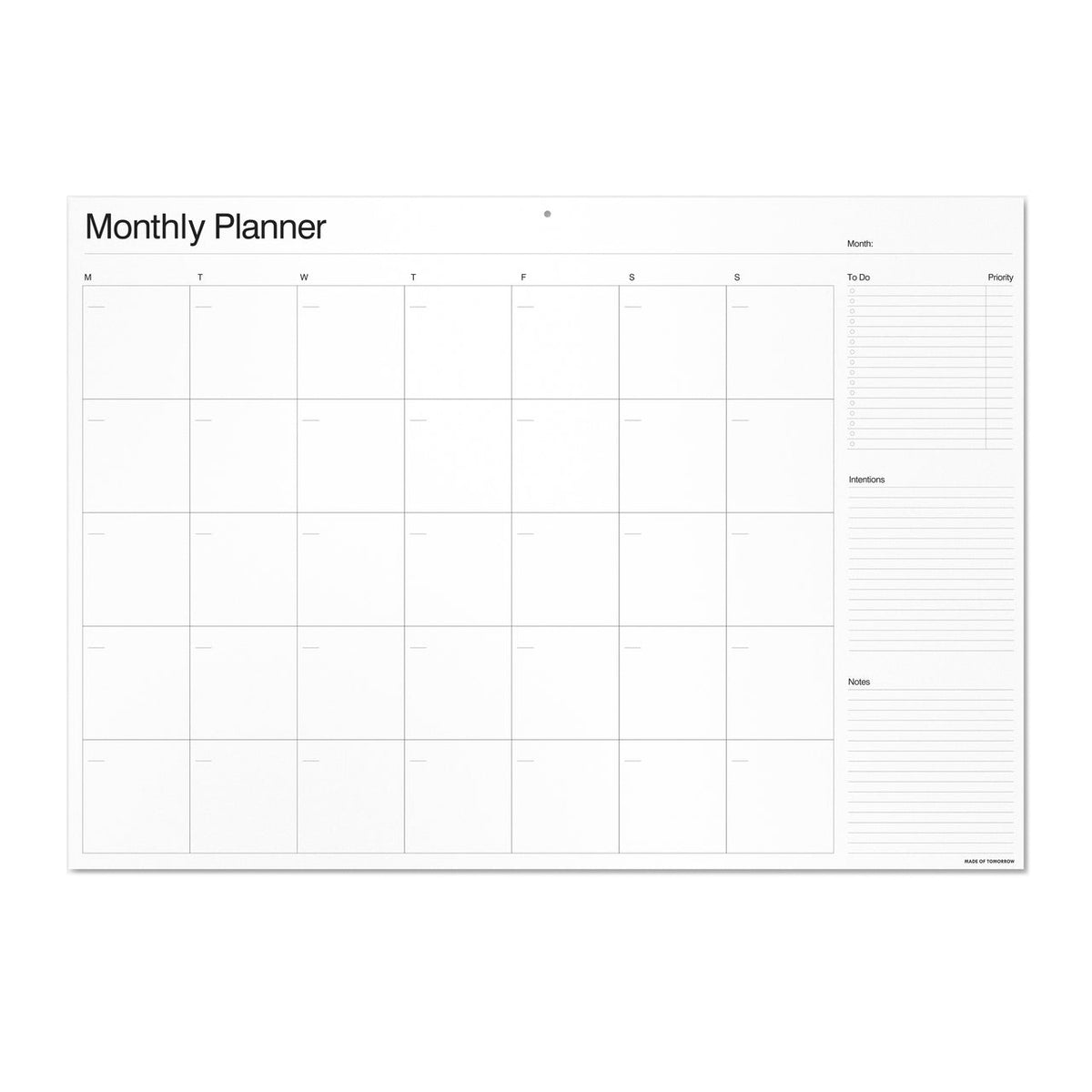 A2 Monthly Wall Planner by Made of Tomorrow mounted on a wall