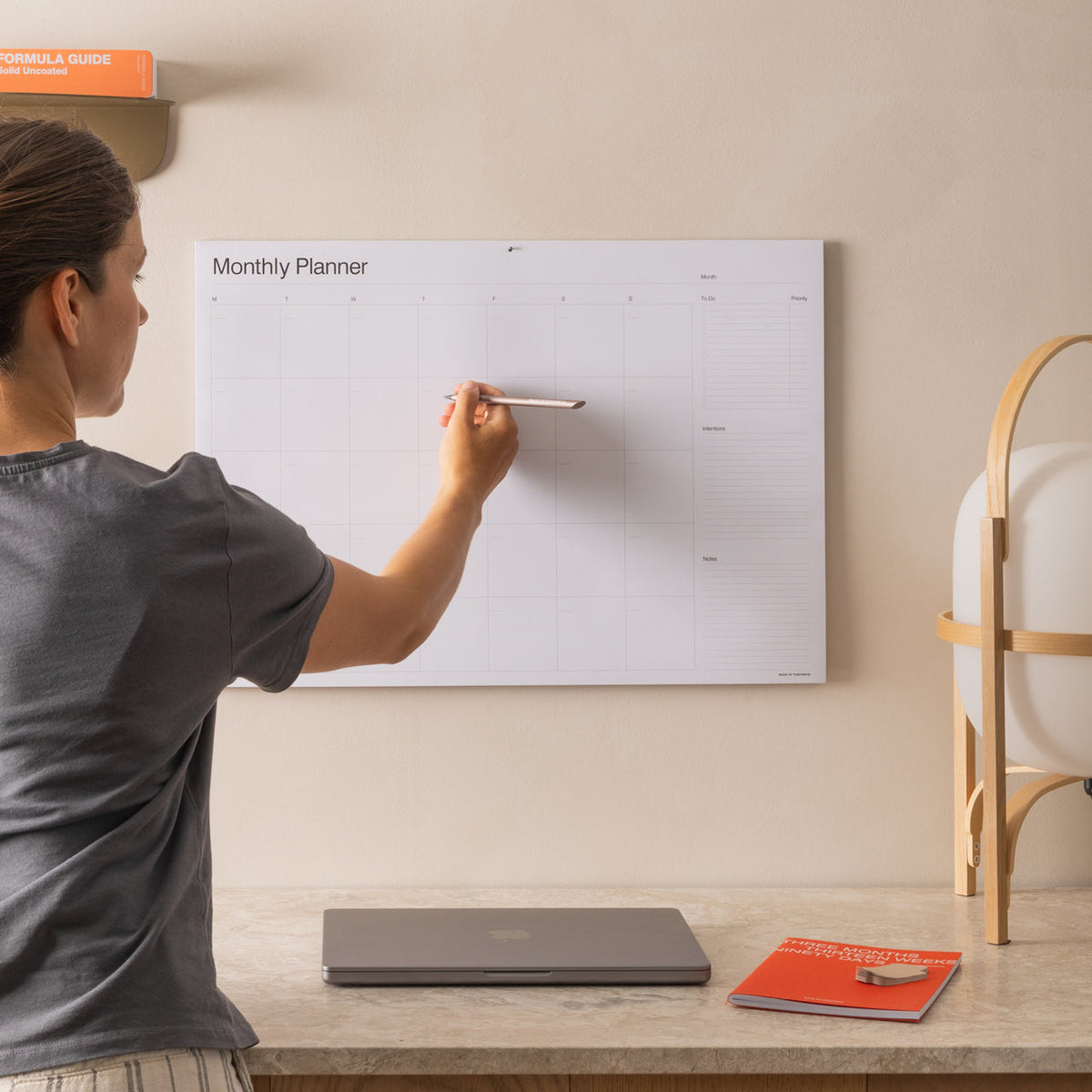 A2 Monthly Wall Planner styled in a home office