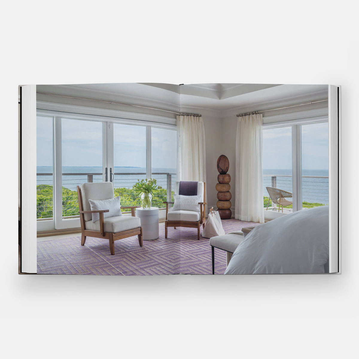Language of Home page spread showing a bedroom with ocean views