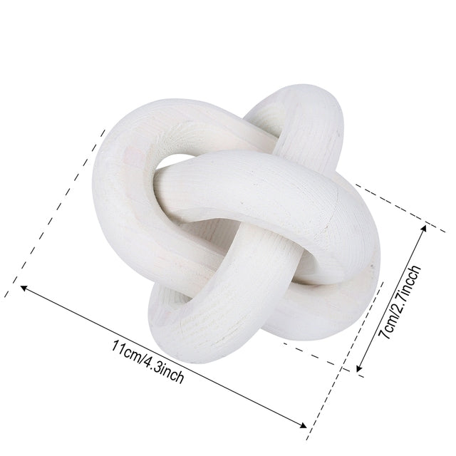 Dimensions diagram for the knot ornament: 11cm across and 7cm deep