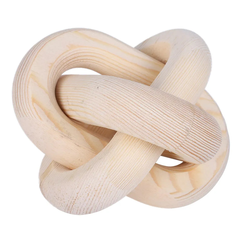 A Wooden Knot Ornament by Flux Home on a white background.