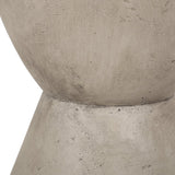 A close up image of a Flux Home Westside Round Accent Table - Stonewash / Black.
