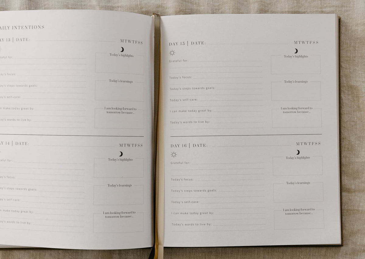 Open daily planning spread of the YOU. journal with dated sections, morning and evening boxes and space for notes