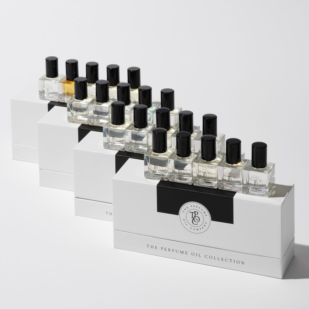 Close-up of the Her Perfume Oil Gift Set packaging and labels