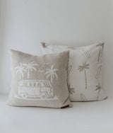 Dune palm and surfboard euro pillowcase behind a dune campervan cushion on white