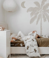 A child's bedroom with a DUVET COVER - SURFING PALM from Bengali Collections wall decal.