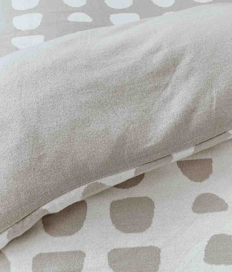 Moon Phase duvet cover with a grey and white polka dot pattern. Brand: Bengali Collections.