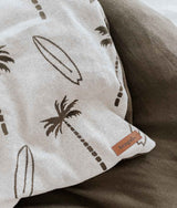A DUVET COVER - SURFING PALM by Bengali Collections with palm trees and surfboards on it.