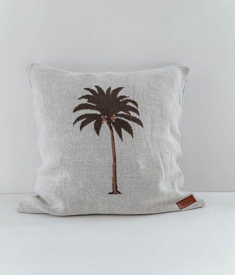A PALM CUSHION COVER with a Bengali Collections logo on it.