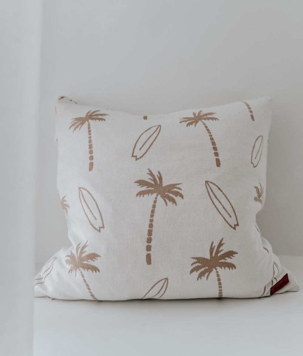 Ivory palm and surfboard euro pillowcase photographed straight on against white