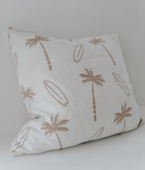 Ivory euro pillowcase printed with natural palm trees and surfboards, side angle