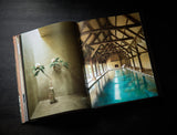 Axel Vervoordt Portraits of Interiors open spread showing an indoor pool room