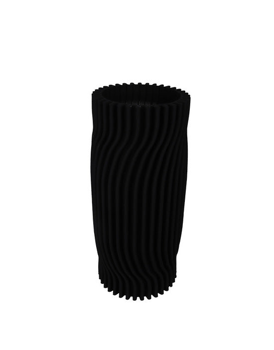 Rocco vase in matte black with fine vertical ribs, large size on a plain background