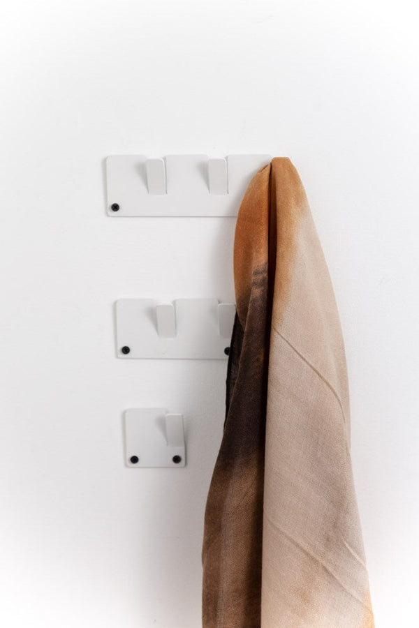 A stylish and efficient organization solution for your space, the Garcia Home Alfa Wall Hooks Set - Various Colours feature three sturdy hooks perfect for hanging scarves and more.