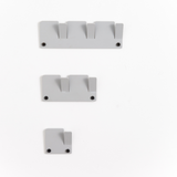 A set of Alfa Wall Hooks Set - Various Colours made of metal construction on a white surface by Garcia Home.